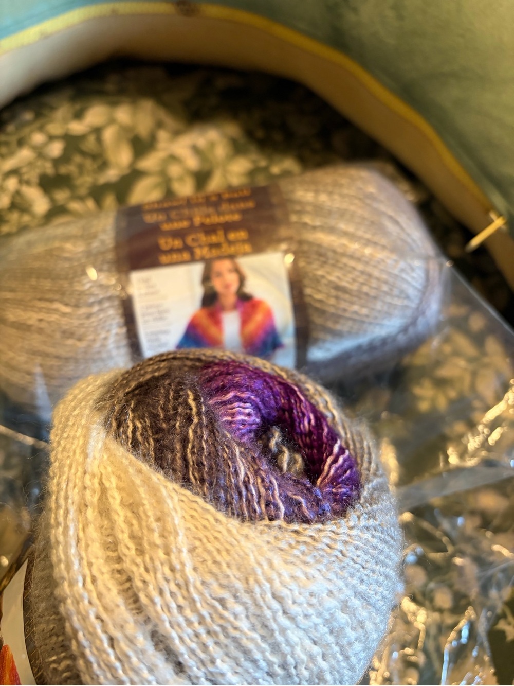 Lion brand shawl in a ball in
mindful mauve, two balls new in plastic.